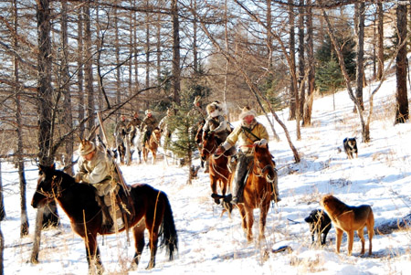 Oroqen hunters hunt in Oroqen ethnic autonomous county in north China's Inner Mongolia Autonomous Region, Dec. 27, 2008. 