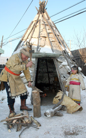 Photo taken on Dec. 28, 2008 shows traditional Oroqen houses in Oroqen ethnic autonomous county in north China's Inner Mongolia Autonomous Region. The Oroqens, one of the least populous ethnic minorities in China, used to be mainly hunters well versant with archery and horsemanship. [Zhou Ning/Xinhua] 