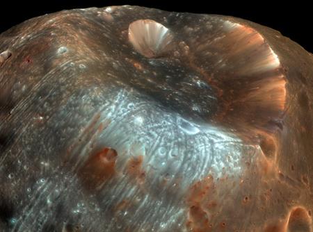 In April the Mars-orbiting HiRISE camera caught new high-resolution snapshots of Phobos, a Martian moon named for the Greek god of horror. The impact that created Stickney is thought to have almost shattered the roughly 17-mile-wide (27-kilometer-wide) moon. [Photo: NASA]