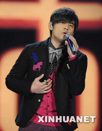 Singer Jay Chou performs at a China Mobile awards ceremony at the Workers' Indoor Arena in Beijing to honor the year's most popular ring-tone music on December 28, 2008.