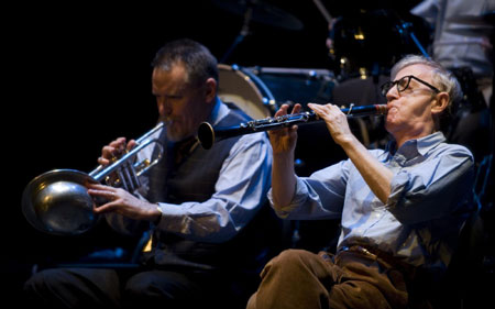 U.S. film director Woody Allen plays the clarinet during a performance with his New Orleans Jazz Band at the Calderon Theater in the central Spanish town of Valladolid December 29, 2008. 