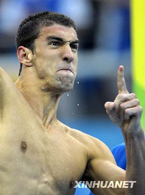 Michael Phelps of the United States celebrates after his team won the men's 4x100m medley relay final at the Beijing 2008 Olympic Games in the National Aquatics Center, or the Water Cube, in Beijing, Aug. 17, 2008.