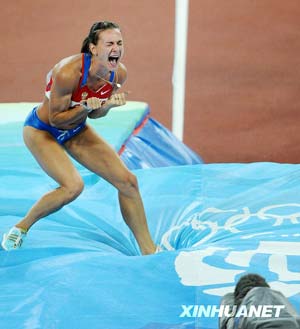 Yelena Isinbayeva of Russia celebrates after breaking the world record during the women's pole vault final of the athletics competition in the National Stadium at the Beijing 2008 Olympic Games in this August 18, 2008 file photo. Predictably, Isinbayeva set a world women's pole vault record for the second time in as many Games. Agility, athleticism and artistry fused as Isinbayeva soared 5.05 metres to set her 24th world record. 