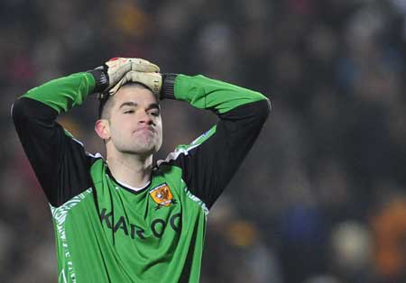 Hull City's Boaz Myhill reacts during their English Premier League soccer match against Aston Villa in Hull Dec. 30, 2008. 