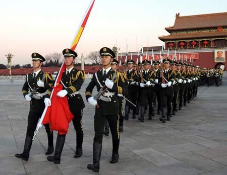 The flag-raising ceremony is held on Tian'anmen Square in Beijing, capital of China, Jan. 1, 2009. Some 12,000 people from around the country attended the ceremony to welcome the new year. [Xinhua] 