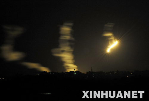 Firelight is seen after an explosion in north Gaza Strip after Israel started the ground operation on Jan. 3, 2009. The Israel Defense Forces (IDF) Saturday evening began its ground operation in the Hamas-ruled Gaza Strip, an IDF spokesman told Xinhua. 