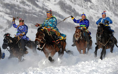 Locals compete in a horse racing in the Kanasi Nature Reserve of northwest China's Uygur Autonomous Region Jan. 2, 2008.
