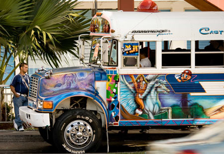 A bus with colorful paintings runs in Panama City, Panama, Jan. 2, 2009. The local authorities of the capital city has made a decision to purchage 420 new buses instead of the old uncomfortable buses which were dubed as 'Diablo Rojo', red evil, due to frequent traffic accidents they caused. 