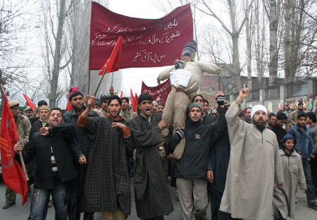 People hold a demonstration to protest against Israel's continued airstrikes on the Palestinians in the Gaza Strip, in Srinagar, summer capital of Indian-controlled Kashmir, on Jan. 3, 2009. 