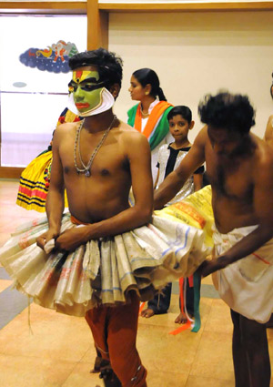 Indian Kathakali artists prepare to perform in Kerala state of India, Jan. 1, 2009. 