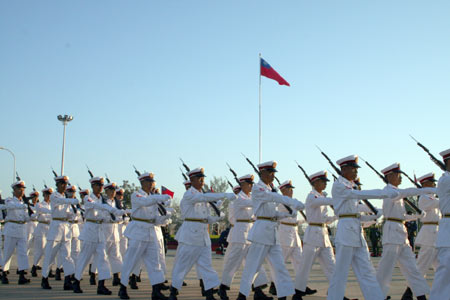 Myanmar's honor guard performs during the flag-raising ceremony for the 61st anniversary of the country's independence, in the new capital Nay Pyi Taw Jan. 4, 2009. [Zhang Yunfei/Xinhua] 