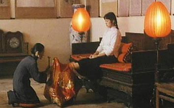 Zhang Yimou's earlier films, 'The Red Lantern'.