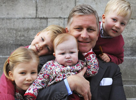 Belgium's Crown Prince Philippe poses with his children in this photograph taken on October 19, 2008 in Brussels and released by the Royal Palace on January 2, 2009. L to R are: Princess Elisabeth, Prince Gabriel, Princess Eleonore, Crown Prince Philippe and Prince Emmanuel. 