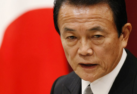Japanese Prime Minister Taro Aso speaks during New Year news conference at his official residence in Tokyo January 4, 2009. [Xinhua/Reuters]