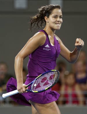 Serbia's Ana Ivanovic hits a backhand against Petra Kvitova of the Czech Republic during their match at the Brisbane International tennis tournament January 5, 2009. [Xinhua]