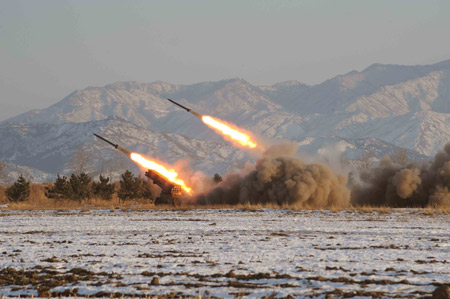 The troops of the Democratic People's Republic of Korea (DPRK) take firing training in this picture released by Korean Central News Agency of DPRK. [Xinhua]