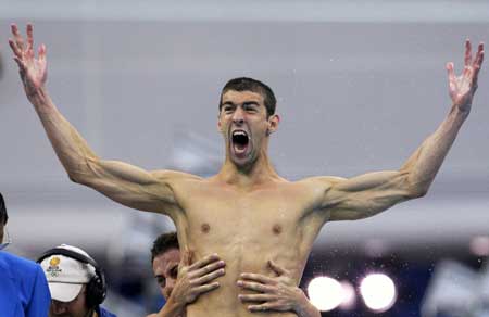 Michael Phelps and Garrett Weber-Gale celebrate after the U.S. won the men's 4x100m freestyle relay swimming final at the National Aquatics Center during the Beijing 2008 Olympic Games, in this August 11, 2008.