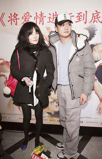 Li Yapeng and Faye Wong show up at the play's premiere last week. 