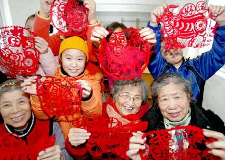 Residents make paper-cuts to mark coming Year of Ox