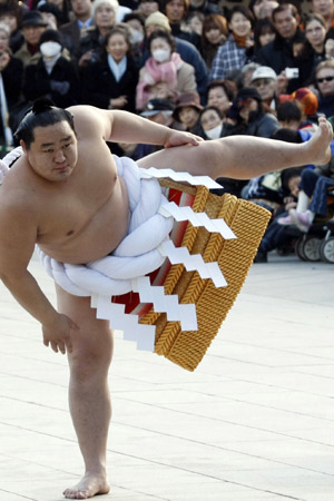 Mongolian-born grand sumo champion Yokozuna Asashoryu performs the New Year's ring-entering rite at Meiji Shrine in Tokyo Jan. 6, 2009. 