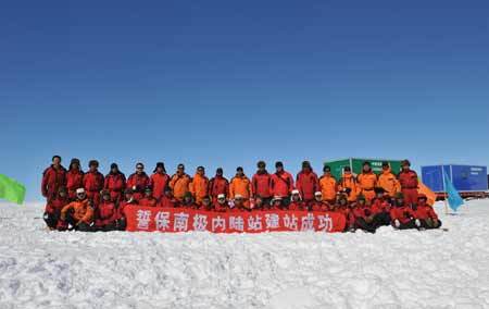 The Chinese 25th Antarctic expedition team pose for a group photograph at Zhongshan Station, Antarctica, on Dec. 18, 2008. 