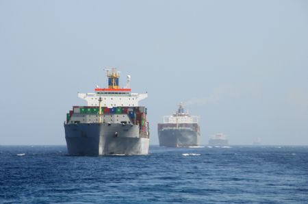 Photo taken from missile destroyer "Wuhan" of a Chinese naval fleet shows four Chinese ships sailing in the Gulf of Aden under the escort of the Chinese naval fleet, Jan. 6, 2009. The Chinese naval fleet arrived Tuesday in the waters of the Gulf of Aden off Somalia to carry out the first escort mission against pirates. Four Chinese ships, including one from China