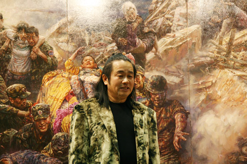 Artist Cao Yong poses for a photo in front of his work on the Sichuan earthquake at the Asian Art Top Show in Beijing on January 5th, 2009. The painter was in Sichuan as a volunteer after the deadly quake jolted the south western Chinese province in May 2008. He later spent four months finishing the work.