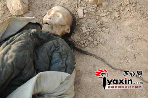 One of the five such mummified corpses is 1.7-meter tall and has a long pigtail. He wears cotton padded jacket and trousers. Construction workers uncovered a total of five male mummies on Monday, January 5, 2009 in Turpan region in northwest China's Xinjiang Uygur Autonomous Region. 