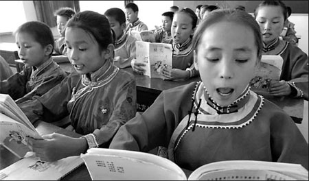 Students attend a class at a school in the Bayinguoleng Mongolian autonomous prefecture in the Xinjiang Uygur autonomous region.