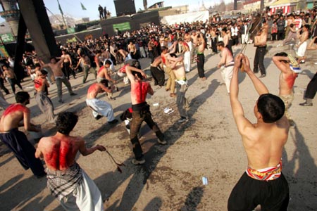 Afghan Shiite Muslims flagellate themselves during Ashura procession in Kabul, capital of Afghanistan, Jan. 7, 2009. Thousands of faithful Shiite Afghan mourners on Wednesday observed Ashura, the day of the martyrdom of the grandson of Prophet Mohammad (PBUH) Imam Hussain and his 72 comrades who were murdered in Karbala of Iraq in 680.[Xinhua] 