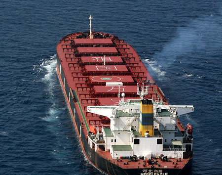 Chinese characters 'Zuguo Wansui' meaning 'Long Live the Motherland' are seen on the main deck of the Hong Kong-flagged merchant vessel 'Hebei Eagle,' escorted by the Chinese fleet, when it sailed across the waters off Somalia, January 7, 2008. A Chinese naval fleet sails into the Gulf of Aden off Somalia earlier this week, starting a three-month mission to protect passing ships against pirates . [Xinhua]