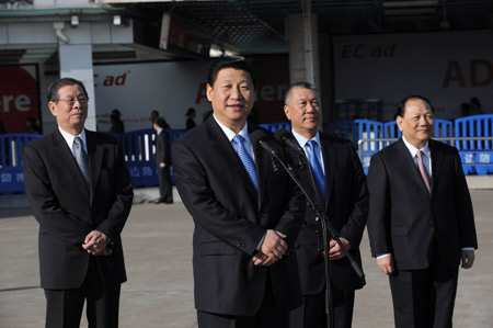 Chinese Vice President Xi Jinping (2nd L) addresses upon his arrival in Macao, south China, Jan. 10, 2009. [Xinhua]