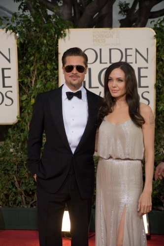 Brad Pitt (left) and Angelina Jolie, nominated for BEST PERFORMANCE BY AN ACTOR IN A MOTION PICTURE PDRAMA for his role in 'THE CURIOUS CASE OF BENJAMIN BUTTON' and BEST PERFORMANCE BY AN ACTRESS IN A MOTION PICTURE DRAMA for her role in CHANGELING, attend the 66th Annual Golden Globes Awards at the Beverly Hilton in Beverly Hills, CA Sunday, January 11, 2009.[China.org.cn/goldenglobes.org] 