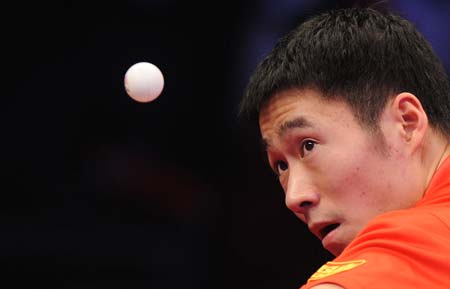 China's Wang Liqin serves during the men's semifinal against Germany's Timo Boll at the 2008 table tennis tournament of champions in Changsha, capital of central-south China's Hunan Province, Jan. 11, 2009. Wang won 4-3 and advanced to the final. (Xinhua/Li Ga)