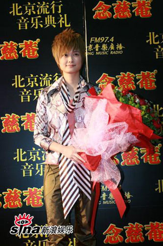 Supergirl Li Yuchun poses for photos at the Beijing Pop Music Awards ceremony, organized by Beijing Music Radio FM 97.4 on Sunday January 11th, 2009. 