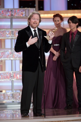 Andrew Stanton accepts The Golden Globe for Best Animated Feature Film for 'Wall-E' presented by the Jonas Brothers 