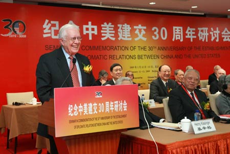 Former U.S. President Jimmy Carter (1st L front) gives a speech during the opening ceremony of The Seminar In Commemoration of The 30th Anniversary of The Establishment of Diplomatic Relations Between China And The United States, in Beijing, capital of China, Jan. 12, 2009. [Pang Xinglei/Xinhua]