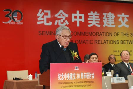 Former U.S. Secretary of State Henry Kissinger (front) gives a speech during the opening ceremony of The Seminar In Commemoration of The 30th Anniversary of The Establishment of Diplomatic Relations Between China And The United States, in Beijing, capital of China, Jan. 12, 2009. [Pang Xinglei/Xinhua]