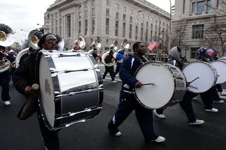 Drummers march during a rehearsal of the Inaugural Parade at the Pennsylvania Avenue in Washington Jan. 11, 2009. The parade will be held after Barack Obama is sworn in as the new President of the United States on Jan. 20. [Jiang Guopeng/Xinhua]