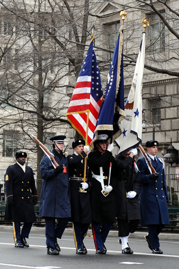 Honor guards march during a rehearsal of the Inaugural Parade at the Pennsylvania Avenue in Washington Jan. 11, 2009. The parade will be held after Barack Obama is sworn in as the new President of the United States on Jan. 20.[Jiang Guopeng/Xinhua]