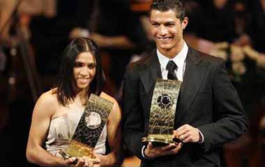 Soccer players Cristiano Ronaldo from Portugal, right, and Marta from Brazil, left, pose with their trophies after being named FIFA Men's and Women's World Player of the Year during the FIFA World Player Gala 2008 at the Opera house in Zurich, Switzerland, Monday, Jan. 12, 2009. [Xinhua/Reuters]