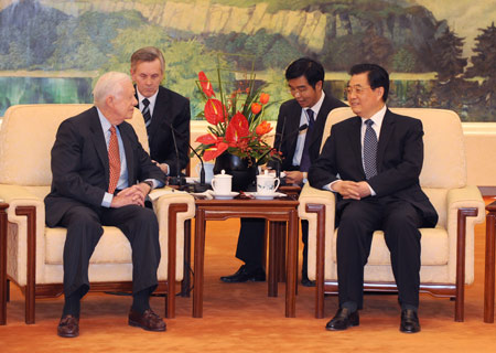 Chinese President Hu Jintao on Monday met with former U.S. President Jimmy Carter as the two nations marked the 30th anniversary of diplomatic ties.