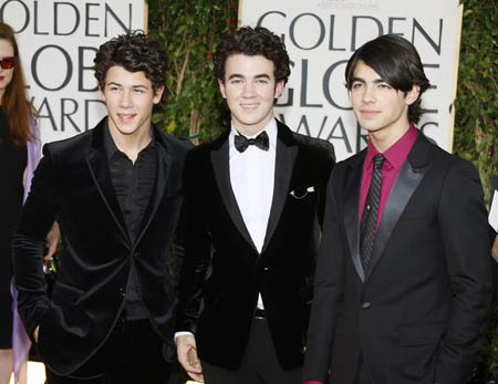 Nick Jonas, Kevin Jonas and Joe Jonas from the band 'The Jonas Brothers'' arrive at the 66th annual Golden Globe awards in Beverly Hills, California January 11, 2009.