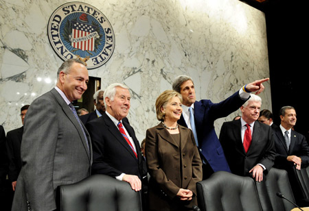 Hillary Clinton (3rd L front) arrives to testify before the Senate Foreign Relations Committee hearing on her nomination to be Secretary of State in the U.S. President-elect Barack Obama administration, on the Capitol Hill, Washington D.C., U.S., on Jan, 13, 2009.[Xinhua]