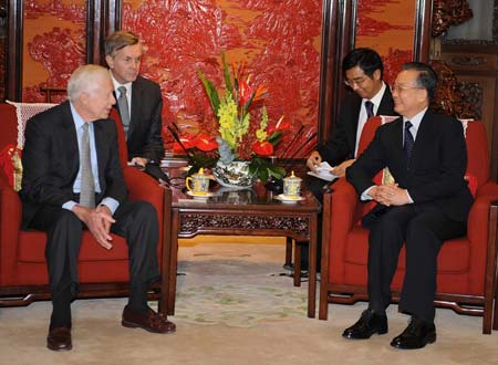 Chinese Premier Wen Jiabao (1st R) meets with former U.S. President Jimmy Carter in Beijing, capital of China, Jan. 13, 2009. (Xinhua/Gao Jie)