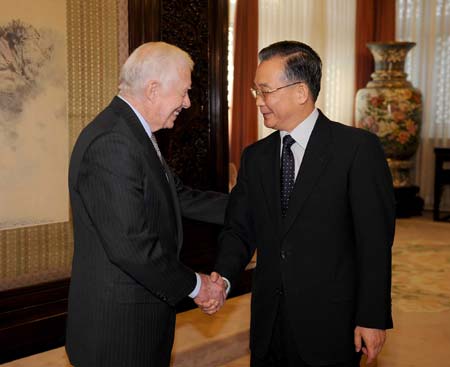Chinese Premier Wen Jiabao (R) meets with former U.S. President Jimmy Carter in Beijing, capital of China, Jan. 13, 2009. (Xinhua/Gao Jie)