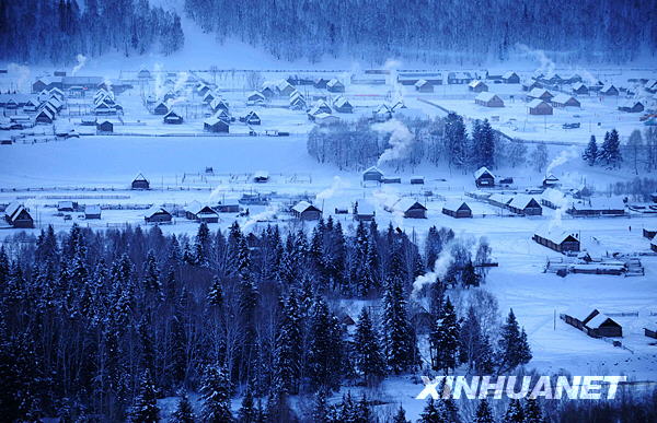 A village blanketed in snow in Kanas, one of the best-known tourist destinations in northwest China's Xinjiang Uygur Autonomous Region. [Photo: Xinhuanet] 