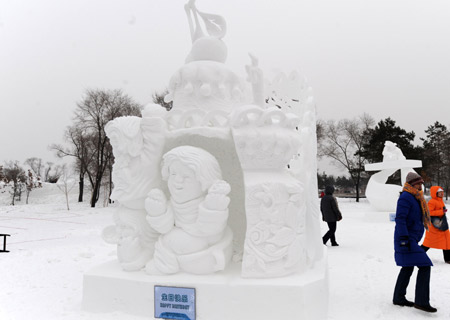 The snow carving Happy Birthday is presented during the 14th Harbin International Snow Carving Contest in Harbin, capital of north China's Heilongjiang Province Jan. 13, 2009. The carving made by a Russian team won the first prize during the contest on Tuesday, as part of the 25th Harbin International Ice and Snow Festival.