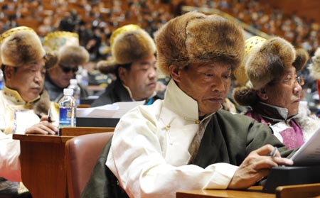 Delegates attend the second session of the Ninth Regional People's Congress of Tibet Autonomous Region in Lhasa, capital of southwest China's Tibet Autonomous Region, Jan. 14, 2009.[Xinhua]