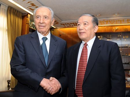 Israeli President Shimon Peres meets with visiting China's special envoy on the Middle East issue Sun Bigan in Jerusalem, Jan. 14, 2009. 